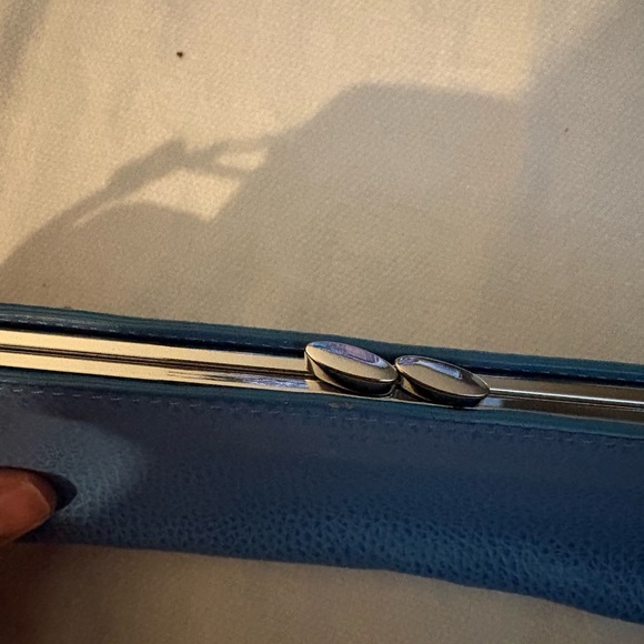 Light blue Lodi’s Clutch leather